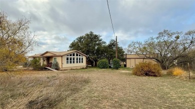 Set on three scenic acres, this exceptional property combines on Creek Bend Golf Course in Texas - for sale on GolfHomes.com, golf home, golf lot