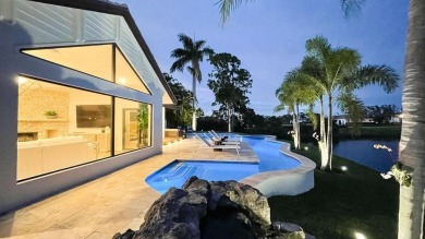 Welcome to 910 Greensward Ln, a stunning contemporary on Seagate Country Club in Florida - for sale on GolfHomes.com, golf home, golf lot