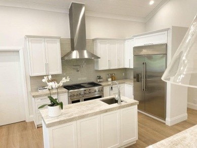 Welcome to 910 Greensward Ln, a stunning contemporary on Seagate Country Club in Florida - for sale on GolfHomes.com, golf home, golf lot