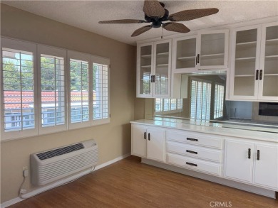 Nestled on a peaceful street, this inviting lower-level 'La on Leisure Village Par 3 Golf Course in California - for sale on GolfHomes.com, golf home, golf lot