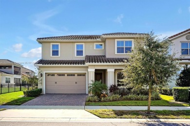 This beautiful home is located in the highly sought-after Lake on Eagle Creek Golf Club in Florida - for sale on GolfHomes.com, golf home, golf lot