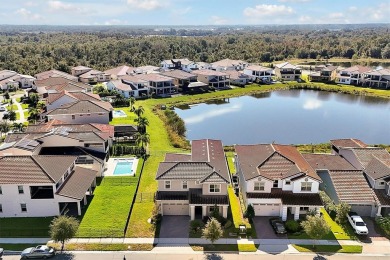 This beautiful home is located in the highly sought-after Lake on Eagle Creek Golf Club in Florida - for sale on GolfHomes.com, golf home, golf lot