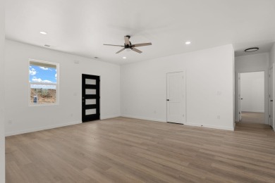Welcome to 133 Chamartin, a stunning custom home ideally located on Tierra Del Sol Golf Course in New Mexico - for sale on GolfHomes.com, golf home, golf lot