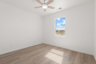 Welcome to 133 Chamartin, a stunning custom home ideally located on Tierra Del Sol Golf Course in New Mexico - for sale on GolfHomes.com, golf home, golf lot