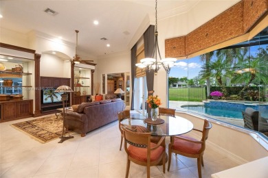 Discover this exquisite 4-bed 3.5-bath w/office & den pool home on Weston Hills Country Club in Florida - for sale on GolfHomes.com, golf home, golf lot