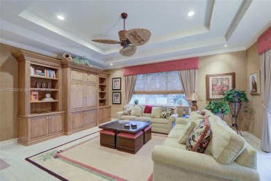 Discover this exquisite 4-bed 3.5-bath w/office & den pool home on Weston Hills Country Club in Florida - for sale on GolfHomes.com, golf home, golf lot