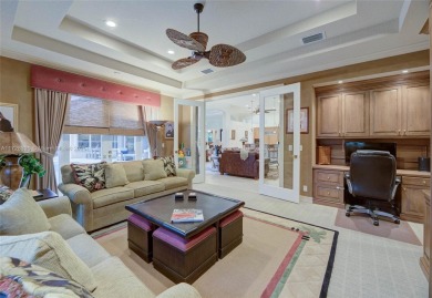 Discover this exquisite 4-bed 3.5-bath w/office & den pool home on Weston Hills Country Club in Florida - for sale on GolfHomes.com, golf home, golf lot