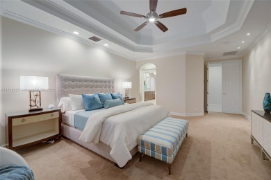 Discover this exquisite 4-bed 3.5-bath w/office & den pool home on Weston Hills Country Club in Florida - for sale on GolfHomes.com, golf home, golf lot