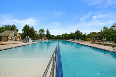 Introducing The Pocono Fairway Chalet, a fully furnished, large on Pocono Farms Country Club in Pennsylvania - for sale on GolfHomes.com, golf home, golf lot