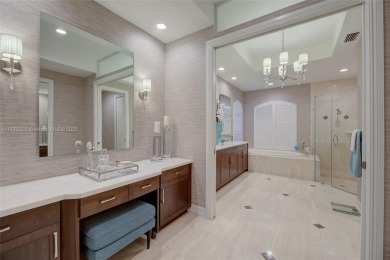 Discover this exquisite 4-bed 3.5-bath w/office & den pool home on Weston Hills Country Club in Florida - for sale on GolfHomes.com, golf home, golf lot