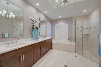 Discover this exquisite 4-bed 3.5-bath w/office & den pool home on Weston Hills Country Club in Florida - for sale on GolfHomes.com, golf home, golf lot