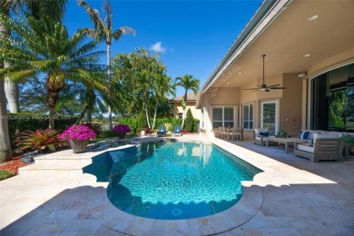 Discover this exquisite 4-bed 3.5-bath w/office & den pool home on Weston Hills Country Club in Florida - for sale on GolfHomes.com, golf home, golf lot