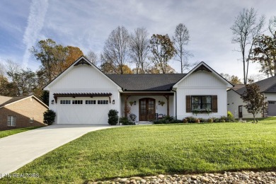 Featured in the 2023 Tellico Village Tour of Homes, this on Toqua Golf Course - Loudon County in Tennessee - for sale on GolfHomes.com, golf home, golf lot