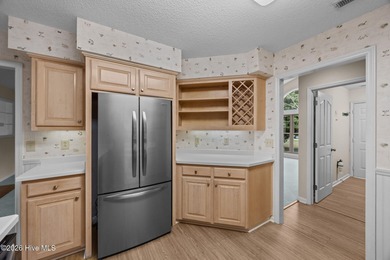 This beautiful brick home is ideally positioned on Fairfield on Harbour Point Golf Club in North Carolina - for sale on GolfHomes.com, golf home, golf lot