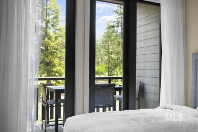 Discover luxury living in this exquisite 2-bedroom, 2-bathroom on Osprey Meadows at Tamarack Resort in Idaho - for sale on GolfHomes.com, golf home, golf lot
