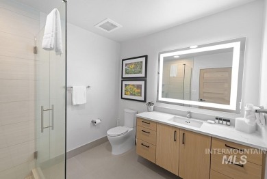 Discover luxury living in this exquisite 2-bedroom, 2-bathroom on Osprey Meadows at Tamarack Resort in Idaho - for sale on GolfHomes.com, golf home, golf lot