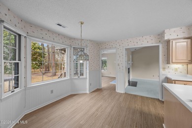 This beautiful brick home is ideally positioned on Fairfield on Harbour Point Golf Club in North Carolina - for sale on GolfHomes.com, golf home, golf lot