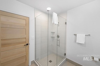 Discover luxury living in this exquisite 2-bedroom, 2-bathroom on Osprey Meadows at Tamarack Resort in Idaho - for sale on GolfHomes.com, golf home, golf lot