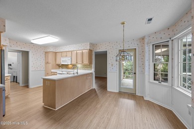 This beautiful brick home is ideally positioned on Fairfield on Harbour Point Golf Club in North Carolina - for sale on GolfHomes.com, golf home, golf lot