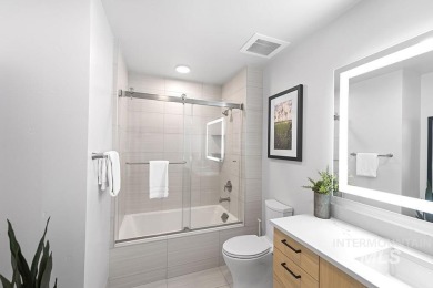 Discover luxury living in this exquisite 2-bedroom, 2-bathroom on Osprey Meadows at Tamarack Resort in Idaho - for sale on GolfHomes.com, golf home, golf lot