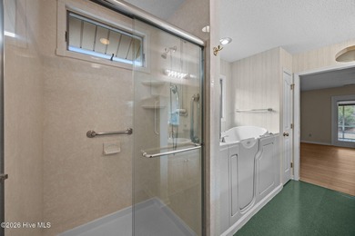 This beautiful brick home is ideally positioned on Fairfield on Harbour Point Golf Club in North Carolina - for sale on GolfHomes.com, golf home, golf lot