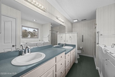 This beautiful brick home is ideally positioned on Fairfield on Harbour Point Golf Club in North Carolina - for sale on GolfHomes.com, golf home, golf lot