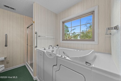 This beautiful brick home is ideally positioned on Fairfield on Harbour Point Golf Club in North Carolina - for sale on GolfHomes.com, golf home, golf lot