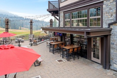 Discover luxury living in this exquisite 2-bedroom, 2-bathroom on Osprey Meadows at Tamarack Resort in Idaho - for sale on GolfHomes.com, golf home, golf lot