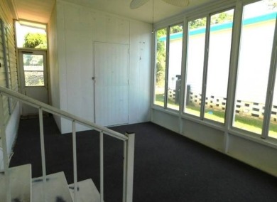 GOLF CART* COMES WITH SALE  PRIVACY PLUS!!   NO NEIGHBORS AT THE on East Bay Golf Club in Florida - for sale on GolfHomes.com, golf home, golf lot