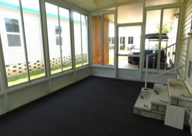 GOLF CART* COMES WITH SALE  PRIVACY PLUS!!   NO NEIGHBORS AT THE on East Bay Golf Club in Florida - for sale on GolfHomes.com, golf home, golf lot