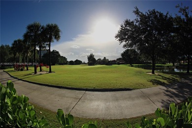 Stunning 2-bedroom corner unit condo with breathtaking golf and on Pembroke Lakes Golf Club in Florida - for sale on GolfHomes.com, golf home, golf lot