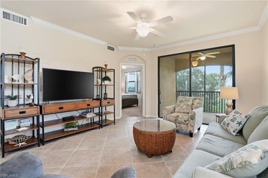 This rarely available second-floor end unit in Bonita National on Bonita National Golf Course in Florida - for sale on GolfHomes.com, golf home, golf lot