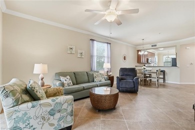 This rarely available second-floor end unit in Bonita National on Bonita National Golf Course in Florida - for sale on GolfHomes.com, golf home, golf lot