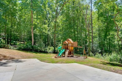 Upon entry, you're greeted by updated marble LVT flooring on Nob North Golf Course in Georgia - for sale on GolfHomes.com, golf home, golf lot