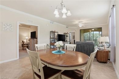 This rarely available second-floor end unit in Bonita National on Bonita National Golf Course in Florida - for sale on GolfHomes.com, golf home, golf lot