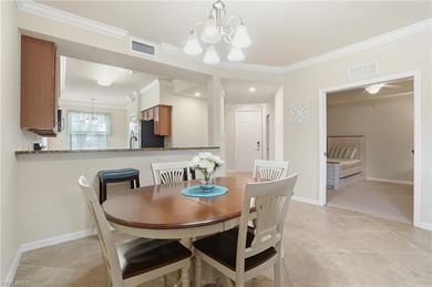 This rarely available second-floor end unit in Bonita National on Bonita National Golf Course in Florida - for sale on GolfHomes.com, golf home, golf lot