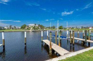 FULLY-FURNISHED, PGI WATERFRONT CONDO W/DEEDED DOCK & SAIL on Saint Andrews South Golf Club in Florida - for sale on GolfHomes.com, golf home, golf lot