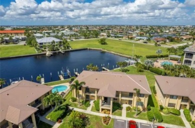 FULLY-FURNISHED, PGI WATERFRONT CONDO W/DEEDED DOCK & SAIL on Saint Andrews South Golf Club in Florida - for sale on GolfHomes.com, golf home, golf lot