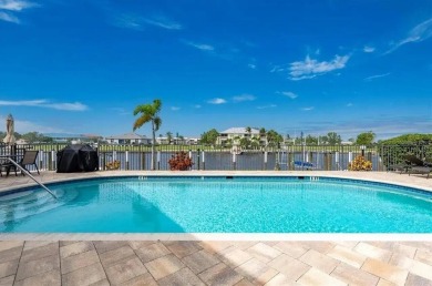 FULLY-FURNISHED, PGI WATERFRONT CONDO W/DEEDED DOCK & SAIL on Saint Andrews South Golf Club in Florida - for sale on GolfHomes.com, golf home, golf lot