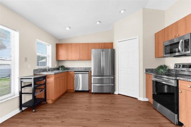 Imagine living in a charming 2-bedroom, 2-bathroom home nestled on Jacaranda West Country Club in Florida - for sale on GolfHomes.com, golf home, golf lot