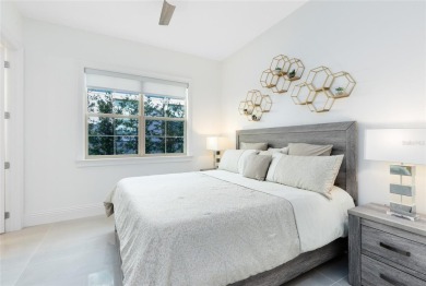 Welcome to an architectural gem in the esteemed Eagle Creek on Eagle Creek Golf Club in Florida - for sale on GolfHomes.com, golf home, golf lot