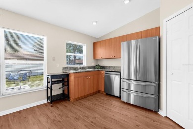 Imagine living in a charming 2-bedroom, 2-bathroom home nestled on Jacaranda West Country Club in Florida - for sale on GolfHomes.com, golf home, golf lot