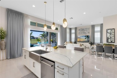 Welcome to an architectural gem in the esteemed Eagle Creek on Eagle Creek Golf Club in Florida - for sale on GolfHomes.com, golf home, golf lot