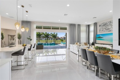 Welcome to an architectural gem in the esteemed Eagle Creek on Eagle Creek Golf Club in Florida - for sale on GolfHomes.com, golf home, golf lot