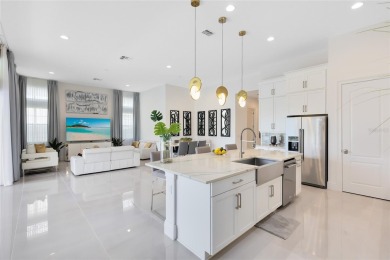 Welcome to an architectural gem in the esteemed Eagle Creek on Eagle Creek Golf Club in Florida - for sale on GolfHomes.com, golf home, golf lot