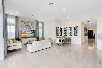 Welcome to an architectural gem in the esteemed Eagle Creek on Eagle Creek Golf Club in Florida - for sale on GolfHomes.com, golf home, golf lot
