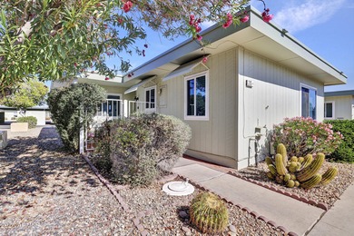 Beautifully updated patio-style townhouse offering modern on PalmBrook Country Club in Arizona - for sale on GolfHomes.com, golf home, golf lot