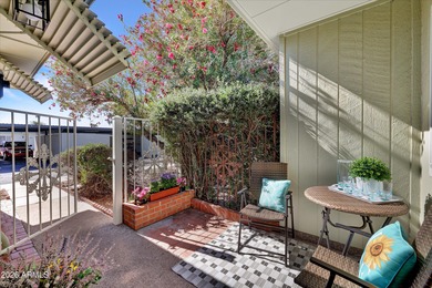 Beautifully updated patio-style townhouse offering modern on PalmBrook Country Club in Arizona - for sale on GolfHomes.com, golf home, golf lot