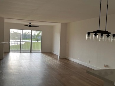 This beautifully remodeled unit is move in ready, it's a must on Atlantis Golf Club in Florida - for sale on GolfHomes.com, golf home, golf lot