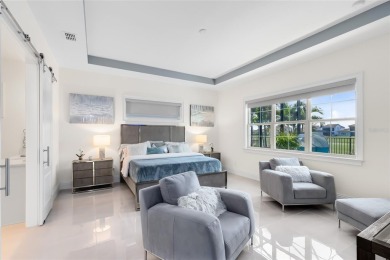 Welcome to an architectural gem in the esteemed Eagle Creek on Eagle Creek Golf Club in Florida - for sale on GolfHomes.com, golf home, golf lot